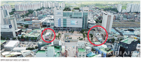 평택역 광장에 철거 예정인 상가 건물(원 안)